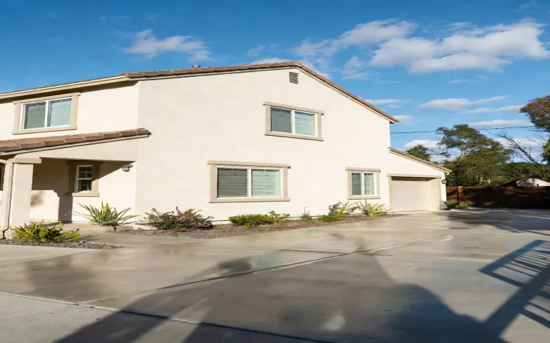 Freshly cleaned concrete driveway and home exterior
